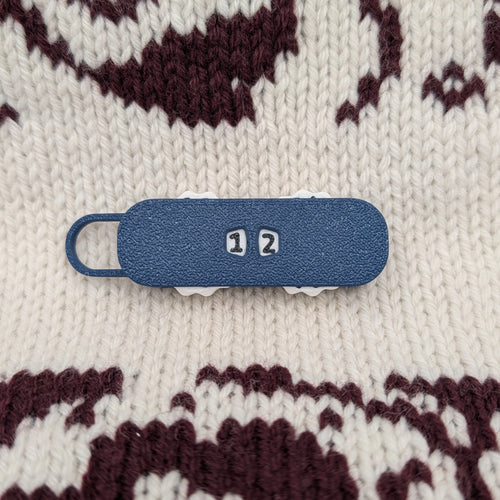 Stitch & Row Counter in Dark Blue on a knit sweater