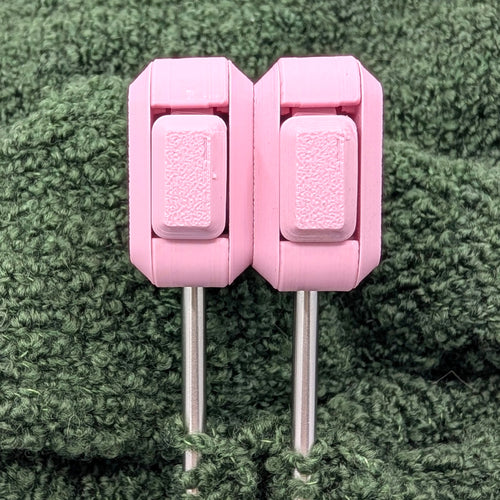 Needle Keepers in Sakura Pink, a pair attached side by side on the needles
