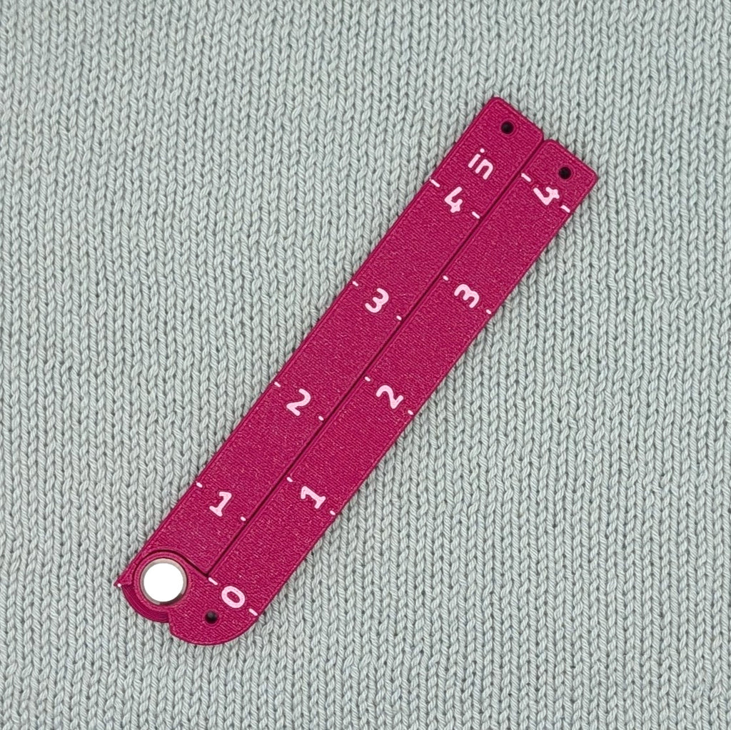 Swatch Gauge in Plum, folded flat, 4 inch side