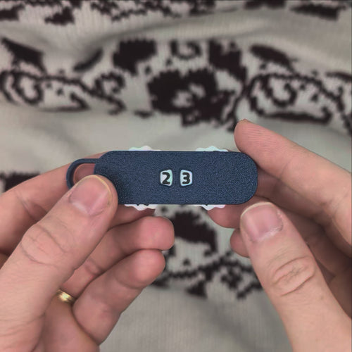 Stitch & Row Counter in Dark Blue, turning a dial
